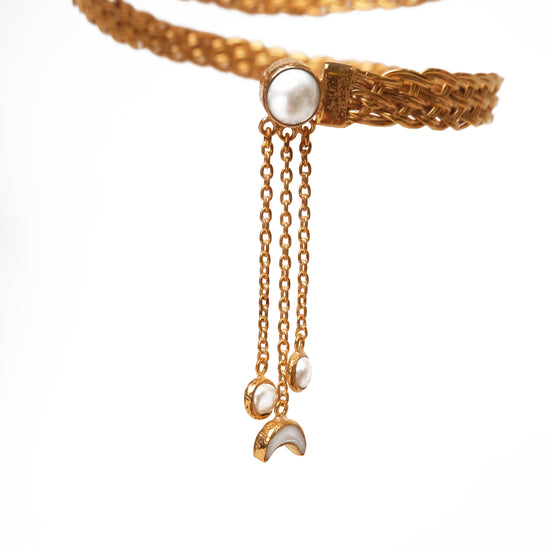 The LADY OF THE SKY Pearl Braided Arm Band